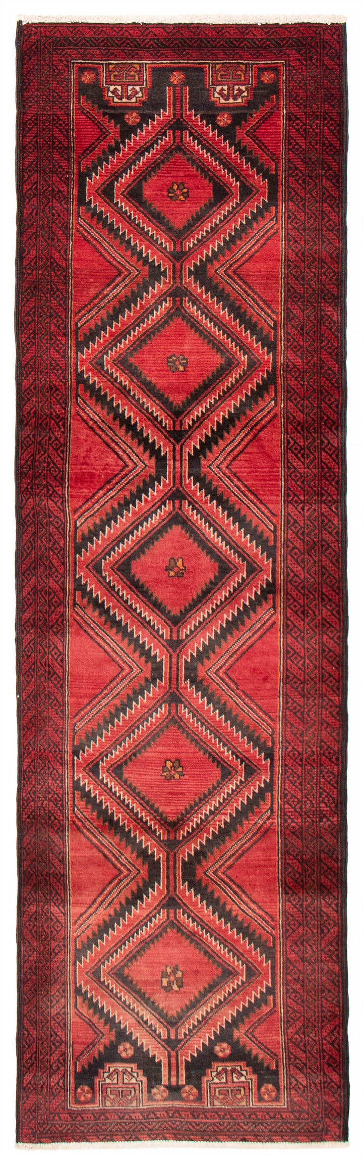 A 2'9" x 9'0" hand-knotted Afghan wool runner with red geometric patterns and black accents. Available at Tuck Rugs.