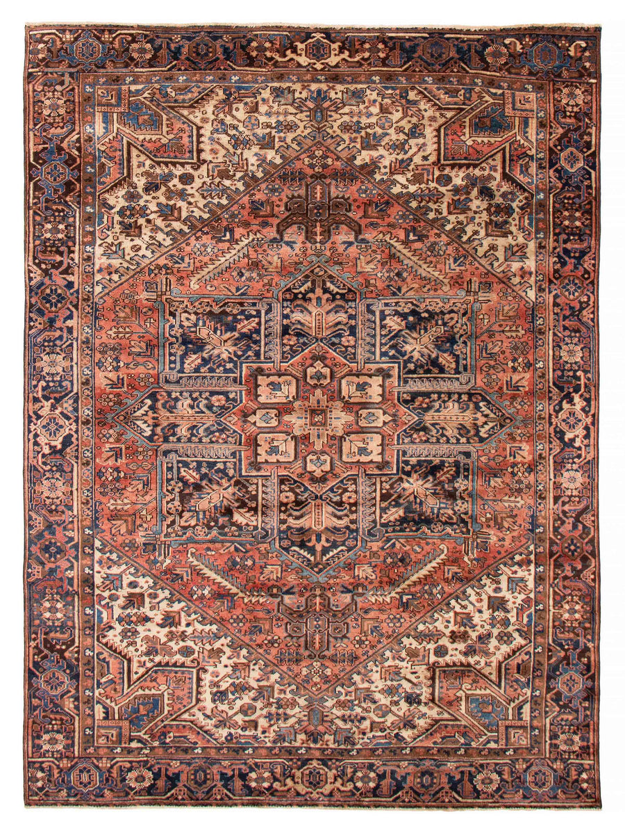 The Partridge Island rug, highlighting intricate geometric patterns in copper, blue, and black tones. Available at Tuck Rugs.