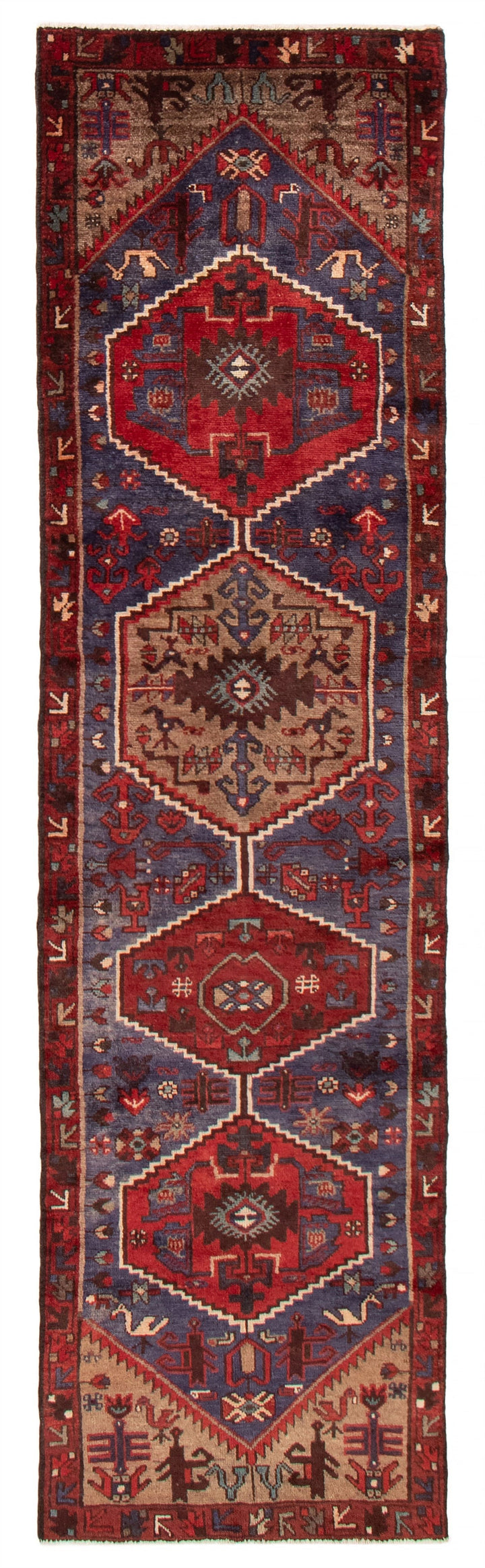 A hand-knotted Turkish wool runner featuring bold hexagonal designs in red, blue, and beige. Available at Tuck Rugs.