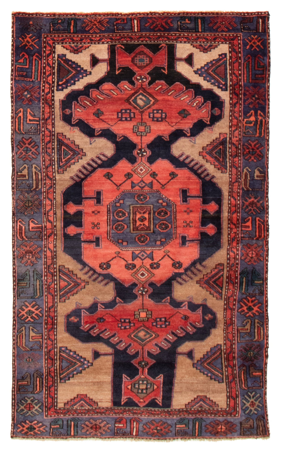 The Kennebecasis Turkish wool rug featuring bold geometric patterns in deep red, blue, and beige tones. Available at Tuck Rugs.