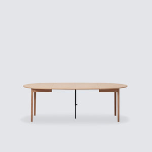 Ease Extendable Round Dining Table