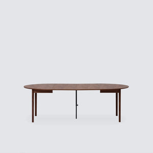 Ease Extendable Round Dining Table
